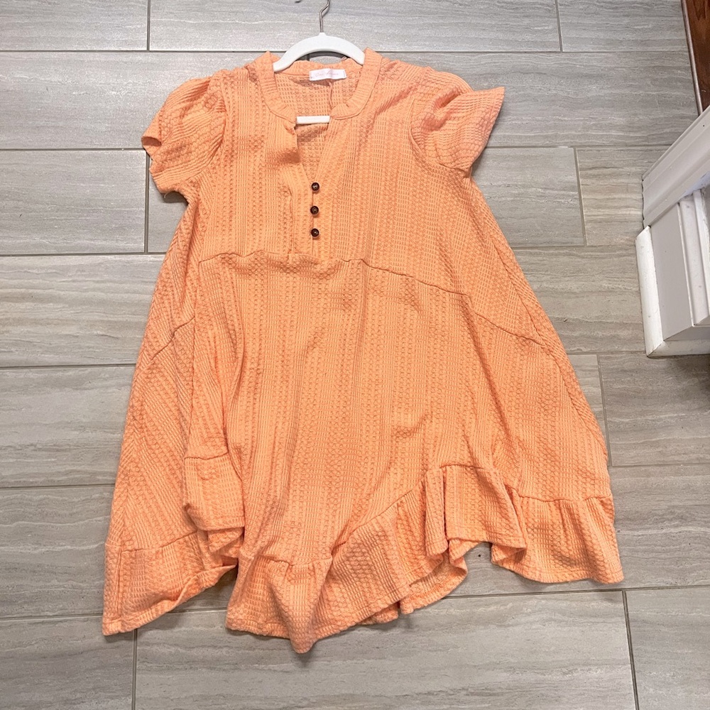 Coral dress with ruffled bottom
